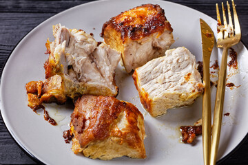 Roasted pork loin chopped into pieces, close-up