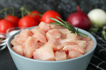 Concept of tasty food with slices of raw chicken fillet, close up