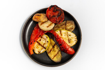 grilled vegetables on white background top view