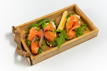 Bruschetta with salmon on a white background