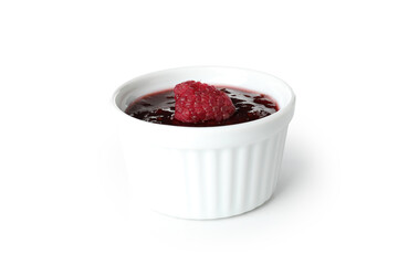 Ceramic bowl of raspberry jam isolated on white background