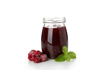 Jar of raspberry jam isolated on white background