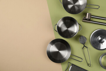 Kitchen utensil on two tone background, top view