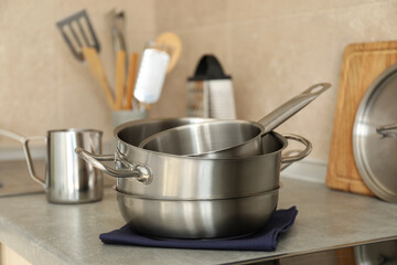 Different utensil on kitchen table, selective focus