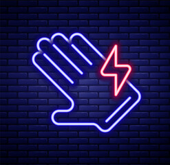 Glowing neon line Electric glove icon isolated on brick wall background. Safety gloves, hand protection. Colorful outline concept. Vector