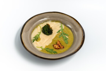 Cauliflower and broccoli cream soup
on a white background
