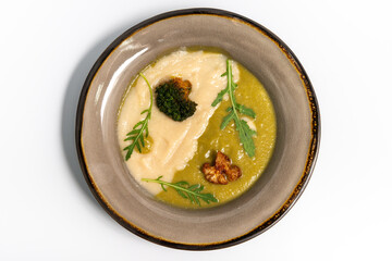 Cauliflower and broccoli cream soup
on a white background