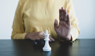Hand of businesswoman moving, chess in competition shows leadership, followers, and business...
