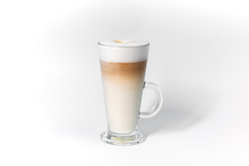 latte coffee in a long transparent glass on a white background