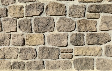 Stone paneling for outdoor home cladding. Rustic style. Background and texture.