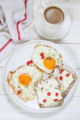 Scrambled eggs with coffee on white background