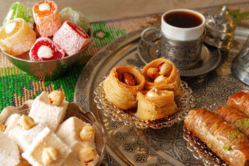 Obraz na płótnie Canvas Turkish Coffee served with Turkish Delight on metal tray