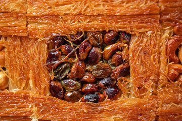 Close up of Turkish Baklava dessert with honey and nuts