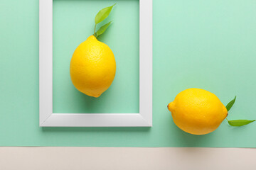 White frame and lemon on green background