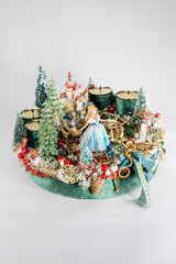 Advent wreath with candles, table handmade arrangement mini decoration for new year, artificial Christmas tree interior decoration