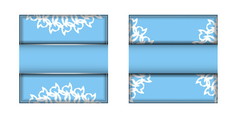 Blue Greeting Flyer with Indian White Ornaments is ready for printing.