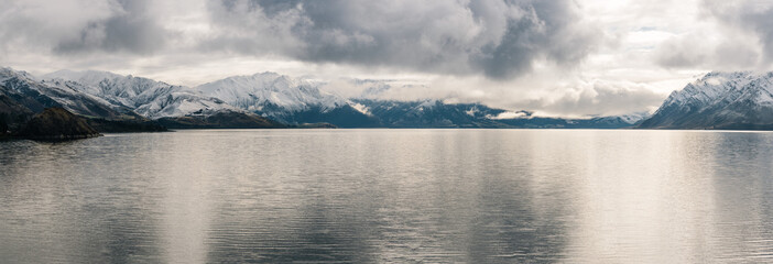 Panoramic view of Lake Hawea and the Southern Alps in winter. Otago Region, New Zealand
