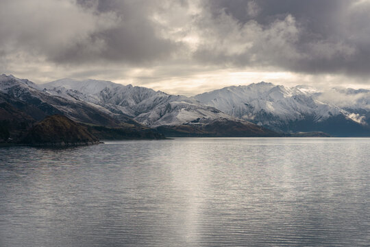 Southerns Alps by Lake Hawea on a cloudy winter day. Otago, New Zealand © Pajaros Volando