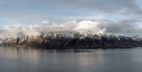 Panoramic view of Southern Alps in Lake Hawea. South Island of New Zealand
