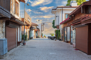 The streets of the city centre, the bazaar and the port area in Side, Antalya. Street views. Cloudy day