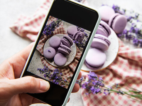 Photo of French desserts macaroon with lavender taken on a smartphone