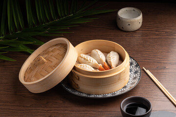 Traditional Asian food in a bowl. Hot dish dumpling