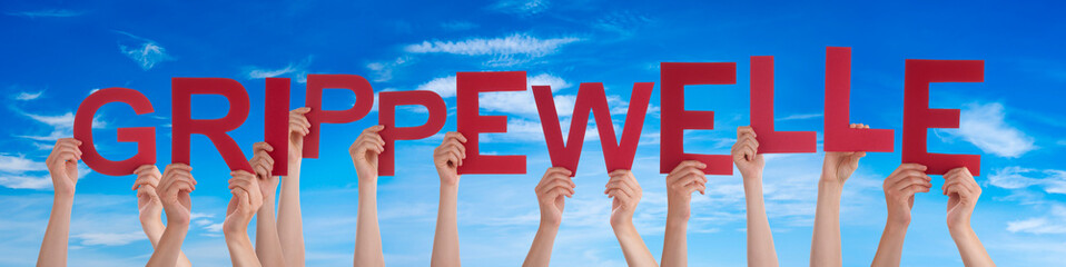 People Hands Holding Word Grippewelle Means Flu Epidemic, Blue Sky