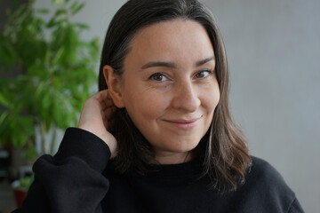 Portrait of a 39 years old woman with gray hair