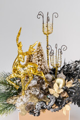 Christmas table composition. Beautiful decoration. Christmas trees, candles, stars, lights and elegant accessories. Merry Christmas and Happy Holidays, Template.