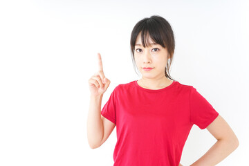 指をさすスポーツインストラクター
