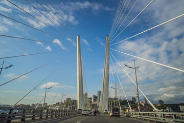 Fototapeta premium Golden, Zolotoy bridge over Zolotoy Rog Bay. Vladivostok. Russia