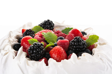 Delicious Pavlova cake with meringue topped and fresh berries