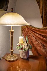 Christmas table composition. Beautiful decoration. Christmas trees, candles, stars, lights and elegant accessories. Merry Christmas and Happy Holidays, Template.