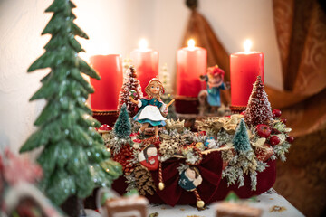 Christmas table composition. Beautiful decoration. Christmas trees, candles, stars, lights and elegant accessories. Merry Christmas and Happy Holidays, Template.