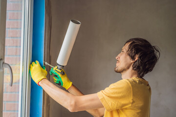 Builder or handyman is engaged in the repair or installation of windows