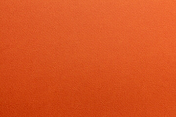 Orange textured art paper surface with gradient