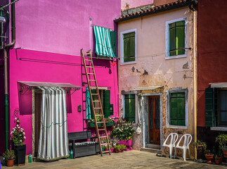 Colorfull painted front houses and Front yard at Brurano Island, Venice, Italy