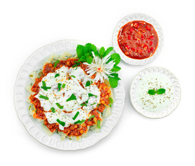 Ashak Afghan Vegetables Dumpling with wonton wrappers filling with Chives ontop Lentil Sauce and seasoned yogurt