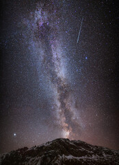 Long time exposure night landscape with Milky Way Galaxy during the Perseids flow.