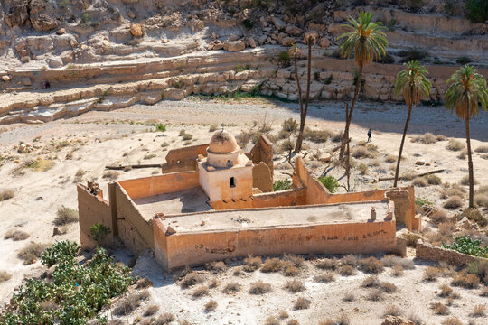 Scenic view of Old stone houses, Palm trees Oasis , Mountains from Ghoufi Canyon in the Aures region, Algeria