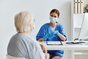 Fototapeta premium elderly woman and doctor examination checkup