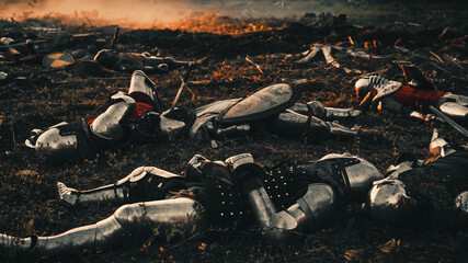 After Epic Battle Bodies of Dead, Massacred Medieval Knights Lying on Battlefield. Warrior Soldiers...