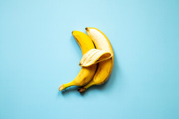 LGBT love concept, two bananas lie side by side, a symbol of male love. - obrazy, fototapety, plakaty