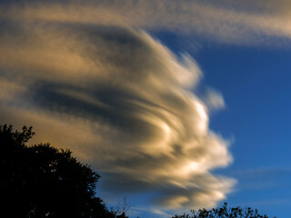 Multiple exposure of a  big cloud at sunrise over the central mountains of Colombia near the town of Villa de Leyva.