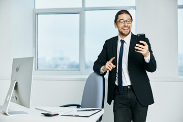 Fototapeta premium male manager documents in hand communication by phone Lifestyle