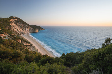 Milos beach near the Agios Nikitas village on Lefkada Ionian island, Greece. Evening sunset golden light