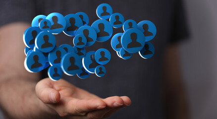 holding 3D rendering group of blue people