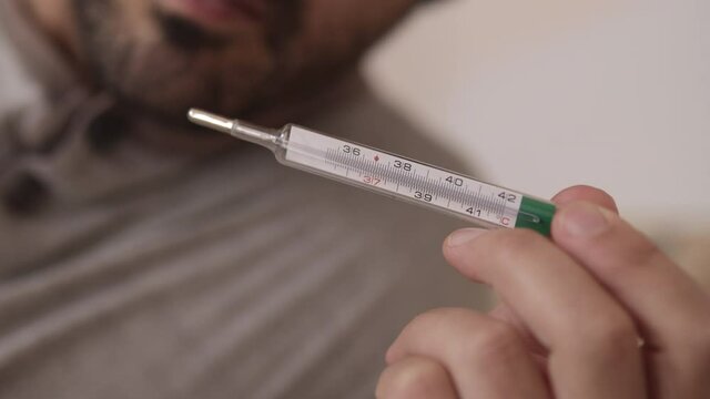 Closeup of thermometer, fever or sickness concept