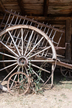old wooden wagon wheel, abandoned