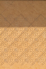 yellow wall that was built in front of the building is a interpretive artwork and is punched into a kind of print and is a beautiful natural marble floor created by the painter.